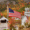 Flag flying over the Stark covered Bridge